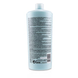 Kerastase Specifique Bain Riche Dermo-Calm Cleansing Soothing Shampoo (Sensitive Scalp, Dry Hair) 1000ml/34oz