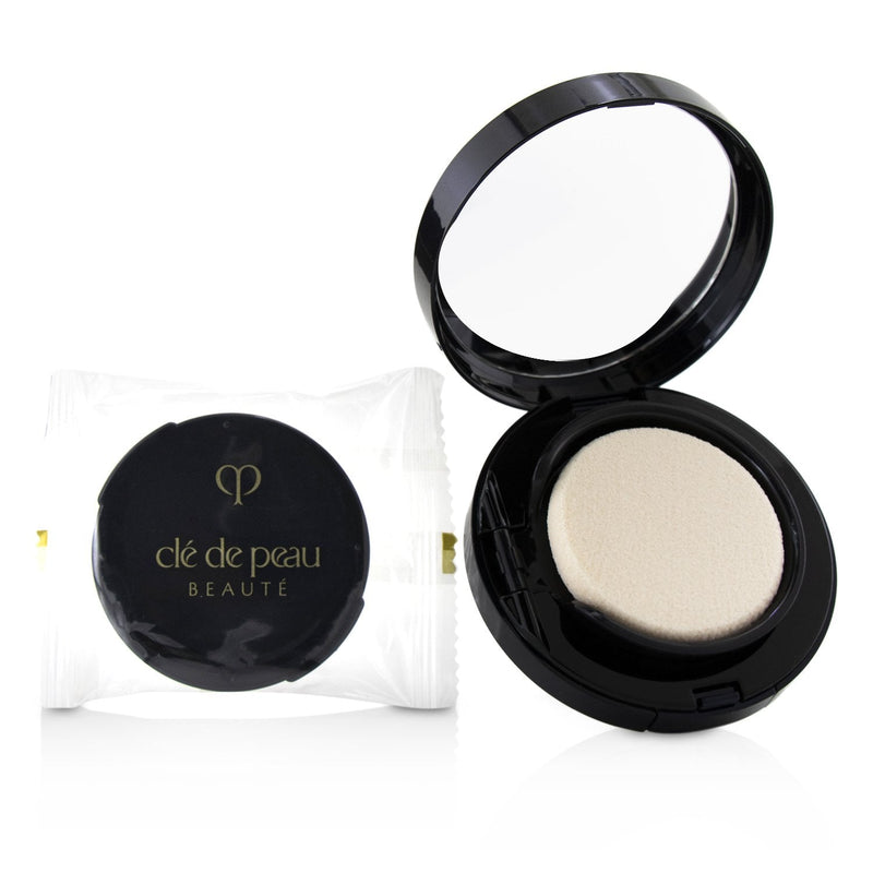 Cle De Peau Radiant Cream To Powder Foundation SPF 25 - # O20 (Light Ochre)  12g/0.42oz