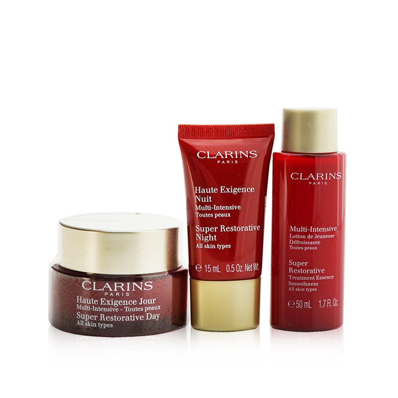 Clarins Super Restorative Collection: Day Cream 50ml+ Night Cream 15ml+ Treatment Essence 50ml+ Pouch 