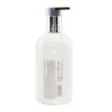 Molton Brown Suede Orris Body Lotion  300ml/10oz