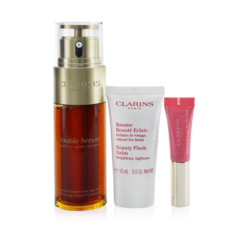 Clarins Double Serum Collection: Double Serum 50ml+ Beauty Flash Balm 15ml+ Natural Lip Perfector #01 5ml+ Bag (Box Slightly Damaged)  3pcs+1bag