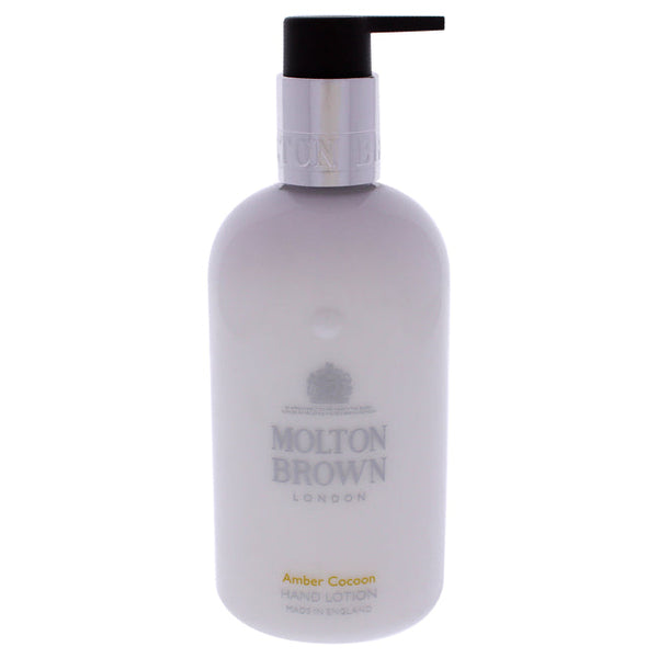 Molton Brown Amber Cocoon Hand Lotion by Molton Brown for Unisex - 10 oz Moisturizer